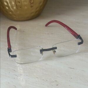 Red and Black Rimless Glasses